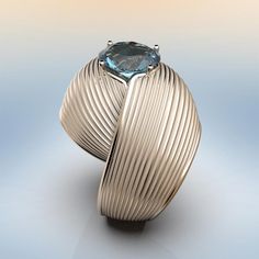 The Eleganza collection is inspired by the voluptuous shapes and sinuous movements of fine fabrics worn on fashion shows. The soft shapes of this ring meet in an elegant embrace, at the centre a natural oval-cut Aquamarine, the delicate Millerighe decoration embellishes it and makes it a unique and special piece of jewellery. 14k or 18k gold 24 mm large on the top Natural Aquamarine 10x 5 x 5.2mm 2.3CTS modern and elegant designed and crafted in Italy Aquamarine Gold Ring, Italian Gold Jewelry, Italian Jewelry, Aquamarine Jewelry, Natural Aquamarine, Fine Fabric, Fashion Shows, Verona, Rings Statement