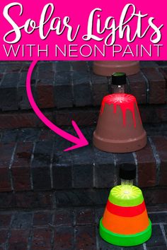 the steps are painted with neon paint and there is a small cone on top of it