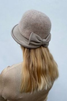 Handmade Ships from a small business in Florida Materials: wool Description ❄️ Cute wool cloche hat with a bow in a variety of colors to choose from! Colors: beige, camel, gray, black ❄️ This hat is foldable hat and it is easy to store and carry. ❄️ Adjustable size to fit 21-23 inch (53-58cm) head circumference. ❄️ Carefully hand-knitted for you from soft 100% wool that will keep you warm and comfortable in winter! ❄️ Makes an ideal gift for her! Winter Wool Cloche Hat, Winter Fitted Cloche Hat, Winter Wool Cloche Felt Hat, Fitted Cloche Winter Hat, Chic Wool Cloche Hat For Winter, Winter Wool Brimmed Cloche Hat, Winter Felt Cloche Hat, Wool Brimmed Cloche Hat For Winter, Classic Winter Cloche Felt Hat