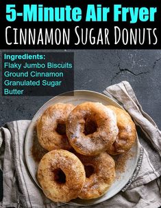 five cinnamon sugar donuts on a plate with the title 5 - minute air fryer cinnamon sugar donuts