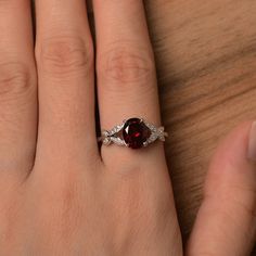 It is natural garnet ring. The main stone is 7 mm*9 mm oval cut.weight about 2.33 carats. The basic metal is sterling silver and plated with rhodium. To change the metal to a solid gold (white/rose) or platinum is also available, please ask for a quotation if you want. You can also go to my shop Home for more elegant rings: https://www.etsy.com/shop/godjewelry?ref=hdr_shop_menu garnet is January birthstone . More garnet rings: https://www.etsy.com/shop/godjewelry?section_id=20709242 Customizatio January Birthstone Rings, Red Garnet Ring, Sunflower Ring, Spinel Ring, Ruby Engagement Ring, January Birthstone, Garnet Ring, Moonstone Jewelry, Ring Oval