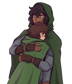 two people hugging each other while one is wearing a cloak and the other has a green cape