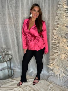 Get ready to make a statement this holiday season with our long sleeve pink silk wrap blazer top. This stylish yet versatile top is the perfect addition to your wardrobe, combining the classic sophistication of a blazer with the delicate femininity of silk fabric. The stunning pink color adds a pop of playful charm, making it the perfect choice for any festive occasion. Runs true to size! Wrap Blazer, Blazer Top, Charm Making, Silk Wrap, Pink Silk, Silk Fabric, Pink Color, Holiday Season, Twist