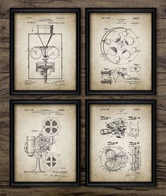 four framed blueprints with drawings on them