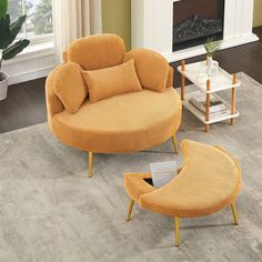 an orange chair and ottoman in a living room