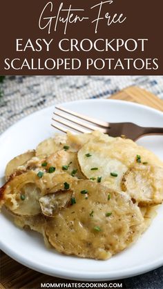 a white plate topped with potatoes covered in gravy