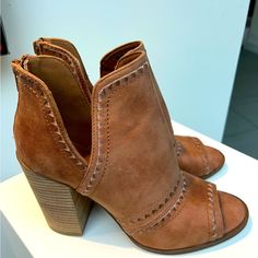 Tan Leather Ankle Booties With Stitching Detail And Split Ankles. 3.75” Block Heel Brown Leather Summer Booties, Suede Open Toe Booties With Stacked Heel, Trendy Open Toe Suede Boots, Spring Brown Faux Leather Booties, Brown Open Toe Booties With Stacked Heel, Spring Leather Booties With 4-inch Heel, Casual Brown Open Toe Booties, Tan Leather Ankle Boots, Leather Ankle Boots