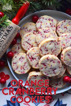 orange cranberry cookies on a white plate