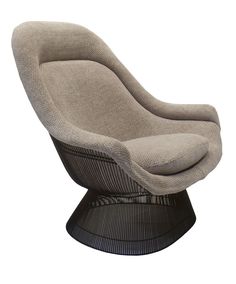 an egg chair with a beige upholstered cushion and black metal base, viewed from the front