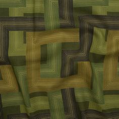 an image of a green and brown pattern on a cloth or material that looks like fabric