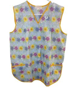 a child's vest with flowers on it