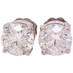 Diamond Stud Earrings Style: Basket Settings with Friction Backs Metal: 14K White Gold TCW: 2.04 Carats Total Diamonds: 2 Round Brilliant Cut Natural Diamonds Color & Clarity: I color, I1 clarity Hallmark: 14K Includes: Certified Appraisal, Elegant Earring Box Retail: $12,500 Sku#10210-15475A Classic Aaa Quality Round Cut Diamond Earrings, Aaa Quality Classic Round Cut Diamond Earrings, Aaa Quality Classic Round Diamond Earrings, Luxury Aaa Quality Round Cut Diamond Earrings, Aaa Quality Round Cut Luxury Diamond Earrings, Earring Box, Diamond Stud Earrings, Diamond Stud, Elegant Earrings