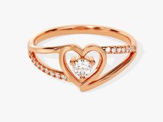 Make a statement with this classic Split Shank Diamond Heart Ring. Crafted with 0.18 ct of diamonds and set in 14K solid gold, this piece of jewelry makes a beautiful and romantic gift. Enjoy the timeless design and dazzle your loved one with its elegant sparkle. DETAILS: --Size Range: 2 US - 11 US--Weight (in 14k Gold): ~ 1.74 grams for Size 6.5 (Depends on the size)--Gold Kt Options: 14k and 18k--Color Options: Yellow Gold, Rose Gold and White Gold--Gemstone: Diamond--Diamond Cut: Round--Numbe Luxury Rose Gold Diamond Ring For Valentine's Day, Luxury Heart Cut Diamond Ring For Valentine's Day, Elegant Diamond Rings For Mother's Day, Elegant Gold Diamond Ring For Valentine's Day, Classic Round Cut Diamond Ring For Valentine's Day, Rose Gold Promise Ring With Open Heart Shape, Elegant Brilliant Cut Diamond Ring For Valentine's Day, Elegant Round Diamond Ring For Mother's Day, Elegant Round Cut Diamond Ring For Valentine's Day