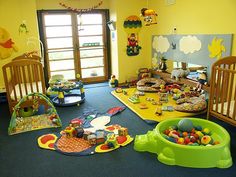 a child's playroom with toys and other items on the floor in it