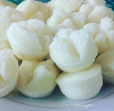 peeled bananas are sitting in a bowl on the table