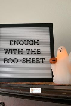 a ghost is next to a sign that says enough with the boo - sheet