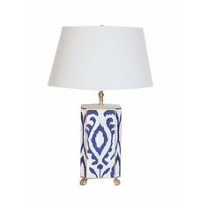 a lamp with a green and white design on it