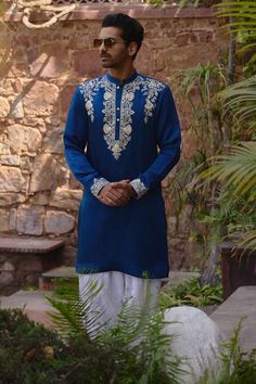 Blue kurta with thread embroidery along the placket. Paired with an ivory salwar. - Aza Fashions Unstitched Slub Silk Kurta With Embroidery, Ceremonial Raw Silk Kurta With Cutdana, Designer Embroidered Kurta In Chanderi, Semi-stitched Embroidered Cotton Silk Kurta, Festive Embroidered Slub Silk Kurta, Eid Traditional Wear Straight Kurta With Resham Embroidery, Designer Unstitched Kurta With Embroidered Border, Traditional Unstitched Slub Silk Suit With Embroidered Border, Chanderi Sherwani With Zari Work For Traditional Ceremonies