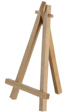 a wooden easel on a white background