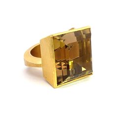 An 18k yellow gold and platinum ring set with a 21x21mm citrine. Designed and made by Michael Zobel. Luxury Faceted Yellow Ring, Modern Gold Topaz Ring In Rectangular Shape, Luxury Gold Topaz Ring With Polished Finish, Modern Gold Topaz Ring, Hallmarked, Modern Gold Ring With Topaz, Modern Gold Rectangular Topaz Ring, Modern Yellow Gold Topaz Ring With Rectangular Shape, Modern Yellow Ring With Polished Finish, Modern Yellow Gold Topaz Ring With Polished Finish