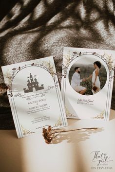 two wedding cards on top of a bed next to an envelope with the image of a bride and groom