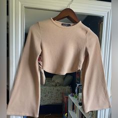 Unworn, Brand New, Perfect Condition; Still Has Tag Attachment String. Model Is F 5'2 155 Lbs Fitted Beige Long Sleeve Top, Fitted Long Sleeve Beige Top For Fall, Fitted Long Sleeve Beige Top, Fitted Long Sleeve Top For Fall Day Out, Beige Fitted Long Sleeve Crop Top, Chic Beige Long Sleeve Crop Top, Chic Long Sleeve Beige Crop Top, Fitted Long Sleeve Sweater For Day Out, Beige Long Sleeve Crop Top For Fall