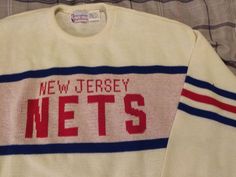 a sweater with the words new jersey nets on it