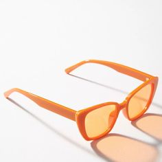 Product Details: Brand New, Never Used. Plastic 100% Uv Protection Spot Clean Imported Dimensions: 5.5"W Orange Mirrored Lenses Cat Eye Sunglasses, Orange Glass Sunglasses For Spring, Trendy Orange Cat Eye Sunglasses With Tinted Lenses, Trendy Orange Tinted Cat Eye Sunglasses, Modern Orange Cat Eye Sunglasses For Summer, Orange Cat Eye Sunglasses For Summer, Casual Orange Cat Eye Sunglasses For Summer, Trendy Orange Cat Eye Sunglasses With Uv Protection, Orange Cat Eye Sunglasses For Beach