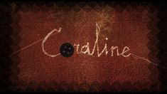 the word cradne written in white chalk on a red background with a black button