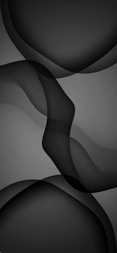 an abstract black and white photo with wavy lines in the middle, on a gray background