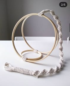 an object made out of rope sitting on top of a table