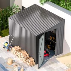 an overhead view of a garage with the door open and tools in the foreground