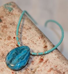 🔹️Included in the Simplicity Series Collection by Shimmer Shimmer this is a one of a kind turquoise blue agate gemstone necklace with dainty, faceted Aqua glass seed beads. Handcrafted in Sedona, Arizona.  🔹️You will receive this exact necklace pictured. Arrives gift boxed with a jewelry pouch.  Colors of gift box and pouch may vary.  🔹️Necklace measures 16 inches long with a 14k gold filled spring clasp closure. Blue Crazy Lace Agate, genuine gemstone Pendant, measures 20mm long (about 3/4 i Blue Gemstone Necklace, Blue Pendant Necklace, Aqua Beads, Gemstone Choker, Sedona Az, Blue Pendant, Necklace Minimalist, Original Jewelry, Crazy Lace Agate