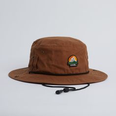 The Seymour Waxed Canvas Boonie Hat at Coal Headwear Waterproof Curved Brim Bucket Hat For Camping, Waterproof Bucket Hat With Curved Brim For Camping, Waterproof Bucket Hat For Camping With Curved Brim, Adjustable Waterproof Bucket Hat For Camping, Waterproof Wide Brim Bucket Hat For Camping, Adjustable Waterproof Bucket Hat For Hiking, Casual Waterproof Bucket Hat For Camping, Casual Waterproof Hat For Camping, Adjustable Brown Hat For Hiking