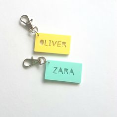 Your child's bag will stand out with one of our colourful personalised bag tags! Cut from pastel acrylic, this keyring measures 5.5cm x 3cm and is attached to a 3cm swivel lobster clasp. Six colours to choose from: PINK, MINT, ORANGE, VIOLET, LEMON & BLUE Wrapping Gift Cards, Bag Tag, Personalize Bag, Bag Tags, Personalized Custom, Pastel Colors, Keychains, Lobster Clasp, Etsy Gifts