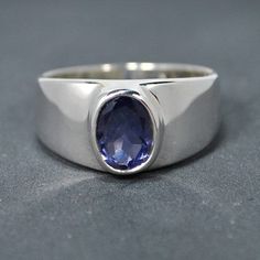 Sterling silver ring with iolite or cordierite setting.  Sizes available see above "finger size" "select an option" and choose your finger size. This ring has been sold to both ladies and men customers so there is a big range of finger sizes available.  Stone size 8x6mm/0,32x0,24 inches. Weight of silver 5gm/0,176oz.   Also available with other gemstones: blue topaz, garnet & peridot. Men's Ring, Multi Stone Ring, Multi Stone, Stone Rings, Sterling Silver Ring, Blue Topaz, Beautiful Rings, Garnet, Silver Ring