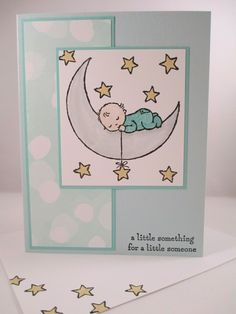 a card with a baby sleeping on the moon and stars around it that says little something for a little someone