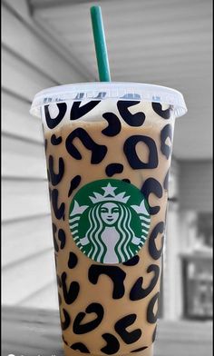 a starbucks drink with leopard print on it