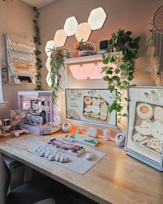 a desk with pictures and other items on it