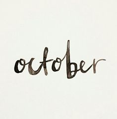 the word october written in cursive ink