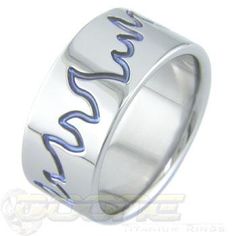 This is one hot ring. Ring is a Flat Profile ring, and the engraved flames are anodized for extra contrast. The flames look to go in either direction, so it won't seem "wrong" if worn one way or the other. The ring shown is 10mm wide in a polished finish. There are options for other colors as well. Flame Jewelry, Flame Ring, Blue Flame, Blue Flames, Blue Rings, Ring Ring, Wedding Rings, Engagement Rings, Ring