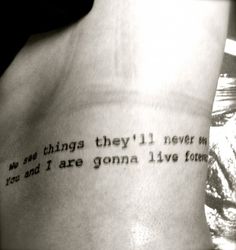 a person with a tattoo that says, things they'll never miss you and i are