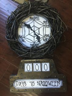 a clock that is sitting on top of a table with words written in the middle