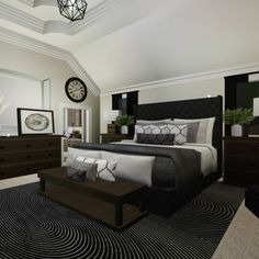 a bedroom with a large bed, dressers and a clock on the wall above it