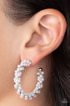 A dainty strand of white pearls is delicately wrapped around a classic silver hoop, creating bubbly refinement. Earring attaches to a standard post fitting. Hoop measures approximately 1 1/2" in diameter.

 Sold as one pair of hoop earrings. White Hoop Earrings, White Pearl Earring, Pearl Hoop Earrings, Paparazzi Accessories, Classic Gold, Paparazzi Jewelry, White Earrings, Shiny Silver, White Beads