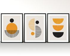 three framed art prints with different shapes and sizes