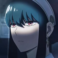 an anime character with blue hair and red eyes looking at something in front of her