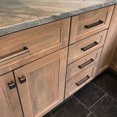 an image of a kitchen setting with marble counter tops