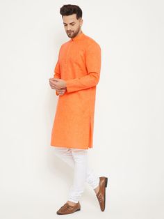 VM BY Vastramay Men's Orange And White Cotton Blend Kurta Pyjama Set Amp up your ethnic style with this stylish kurta pyjama set from VM By Vastramay. Crafted from a comfortable cotton blend, this set features a vibrant orange kurta with intricate white detailing, paired with matching white pyjamas. Perfect for festive occasions or casual gatherings, this set ensures both comfort and style. Features: Stylish orange kurta with intricate white detailing Comfortable cotton blend fabric Perfect for White Pyjamas, Stylish Kurta, White Pajamas, Kurta Pyjama, Ethnic Style, Pyjama Set, Vibrant Orange, Ethnic Fashion, White Cotton