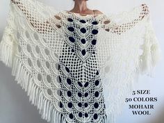 ❤ FAST SHIPPING for USA https://etsy.me/3ygSPbn❤SHIPPING from the USA https://etsy.me/3dmHrSe❤READY TO SHIP: https://etsy.me/3tM4XPH❤WOODEN SHAWL PIN-CLIP HERE: http://etsy.me/3ezPsWgIvory bridesmaid shawl, white bridal cape, off shoulder tribal shawl bridal capeletMeasurements:Size 1---Center height 39'' / 100 cm, Length - top 86" / 220 cm, ) + Fringe 6" / 15cmSize 2---Center height 43' / 110 cm, Length - top 88" / 225 cm, ) + Fringe 6" / 15cmSize 3---Center height 47'' / 120 cm, Length - top 1 Bohemian Wedding Shawl For Winter, Fitted Bohemian Shawl For Wedding, Bohemian Winter Wedding Shawl, White Bohemian Winter Shawl, Bride Bolero, Winter Wedding Shawl, Bridal Capelet, Shawl White, Bridesmaid Wrap